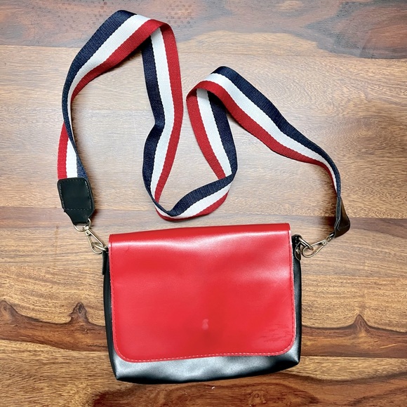 Handbags - Red and black sling bag.